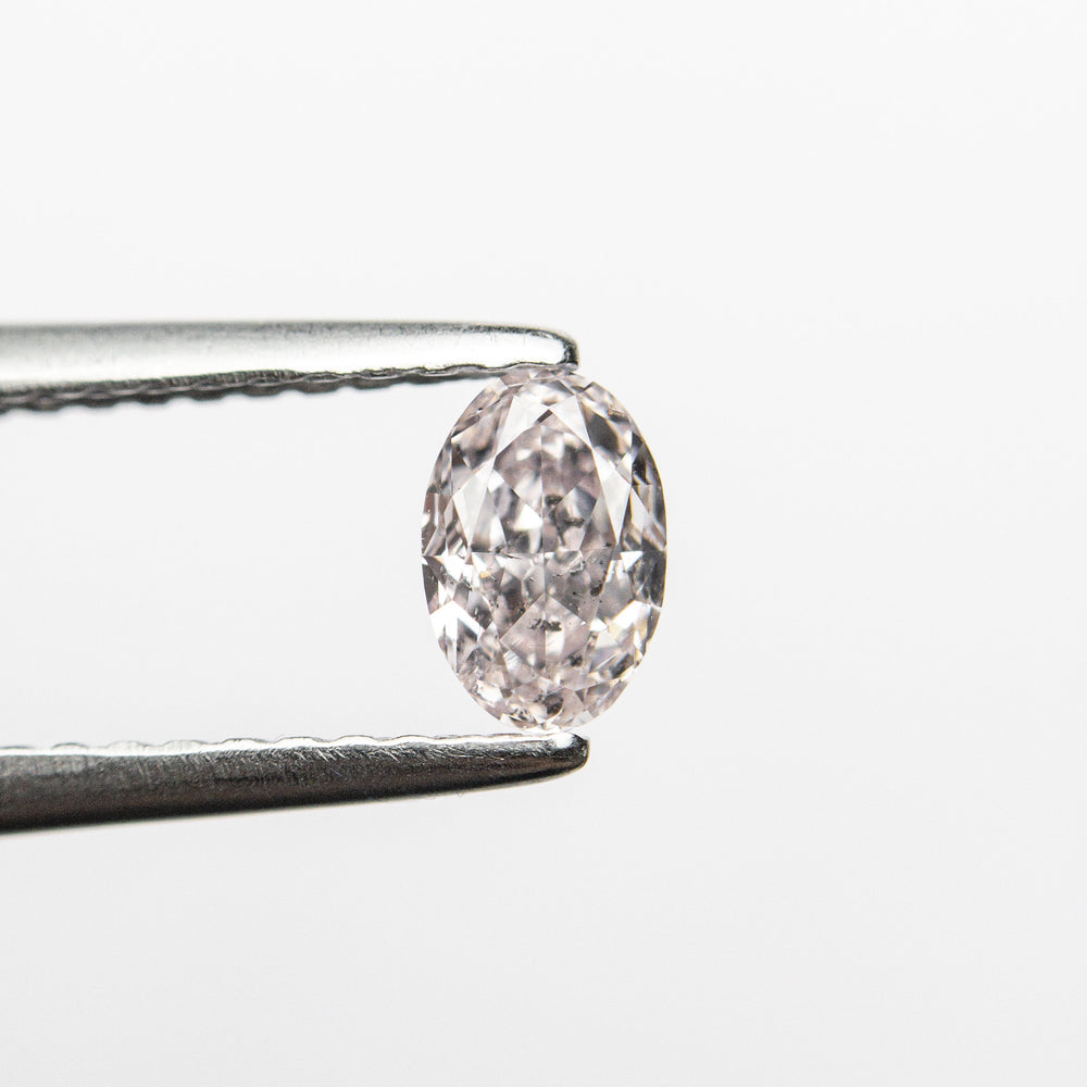 
            
                Load image into Gallery viewer, 0.40ct 5.38x3.60x2.59mm GIA I1 Fancy Pink Oval Brilliant 24094-01
            
        