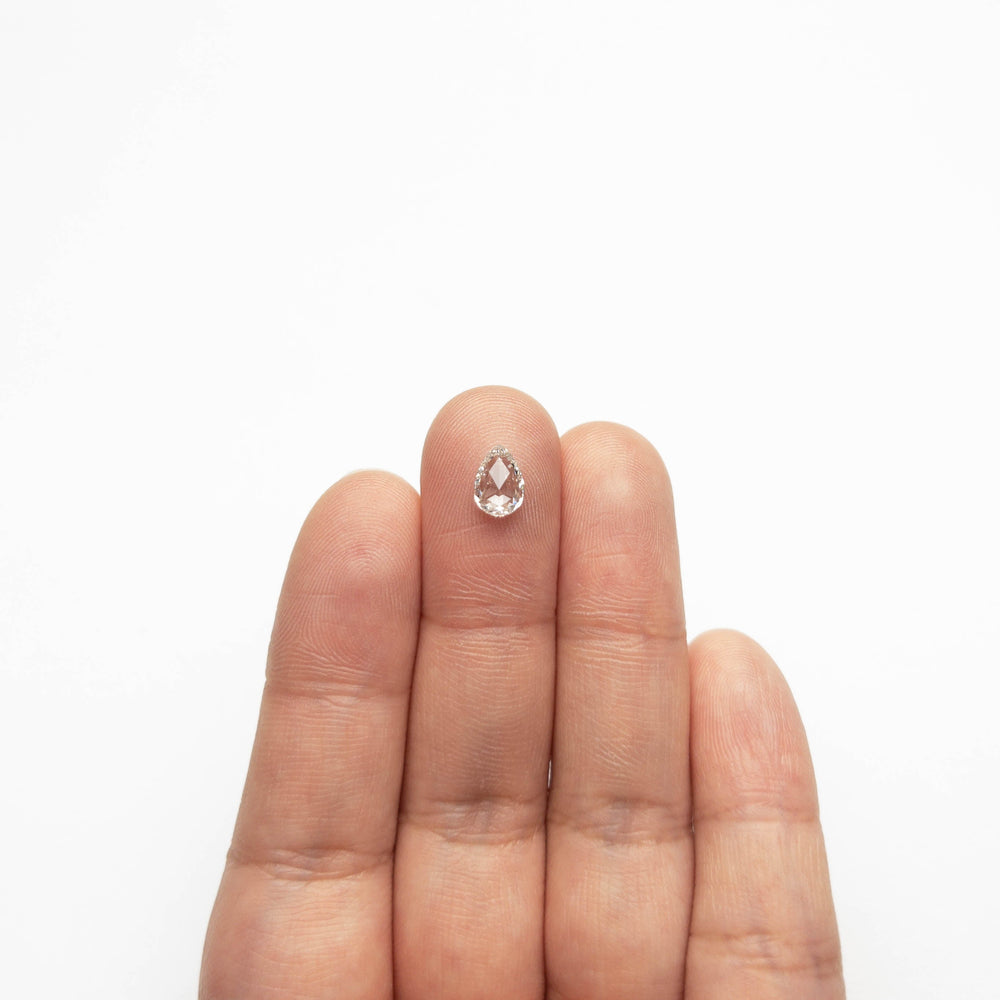 0.73ct 7.61x5.23x2.36mm SI2 H Pear Rosecut 19594-02