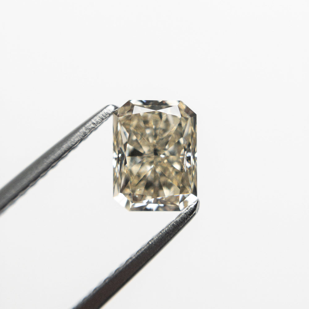 
            
                Load image into Gallery viewer, 1.17ct 6.55x4.97x3.79mm SI1 C3 Cut Corner Rectangle Brilliant 19915-11
            
        