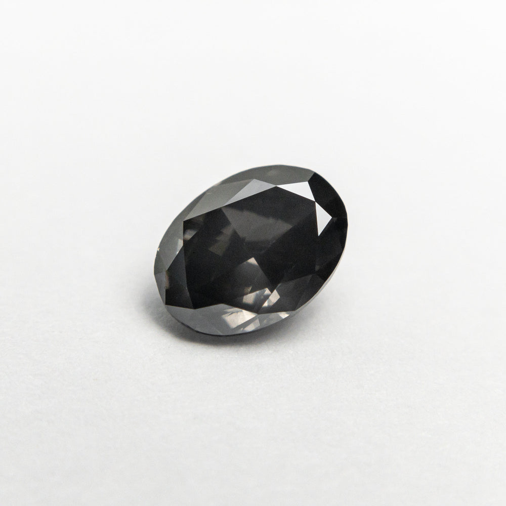 0.70ct 6.42x4.78x2.96mm SI1 Fancy Dark Grey Oval Brilliant 19923-12