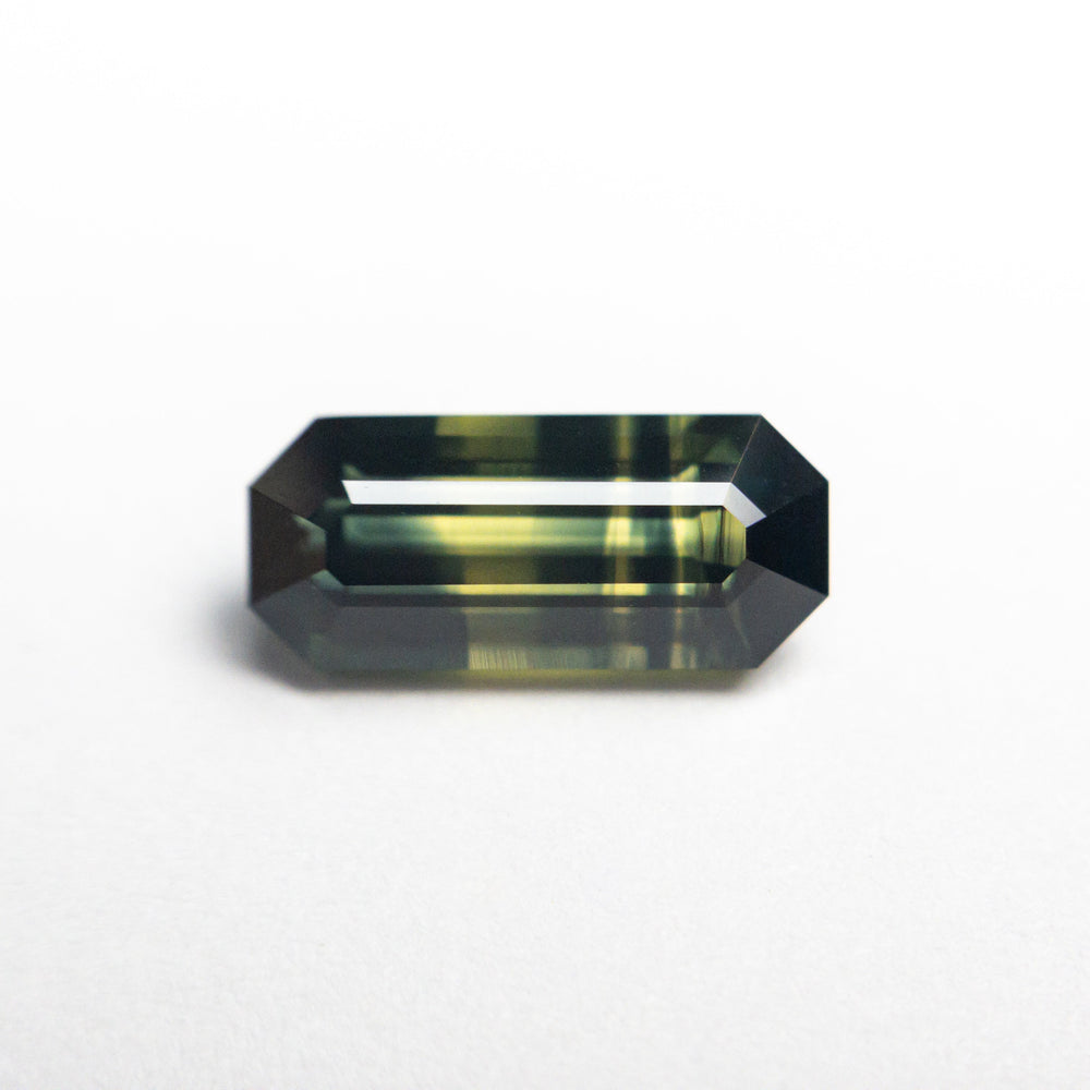 
            
                Load image into Gallery viewer, 1.90ct 10.31x4.57x3.75mm Cut Corner Rectangle Step Cut Sapphire 23444-02
            
        