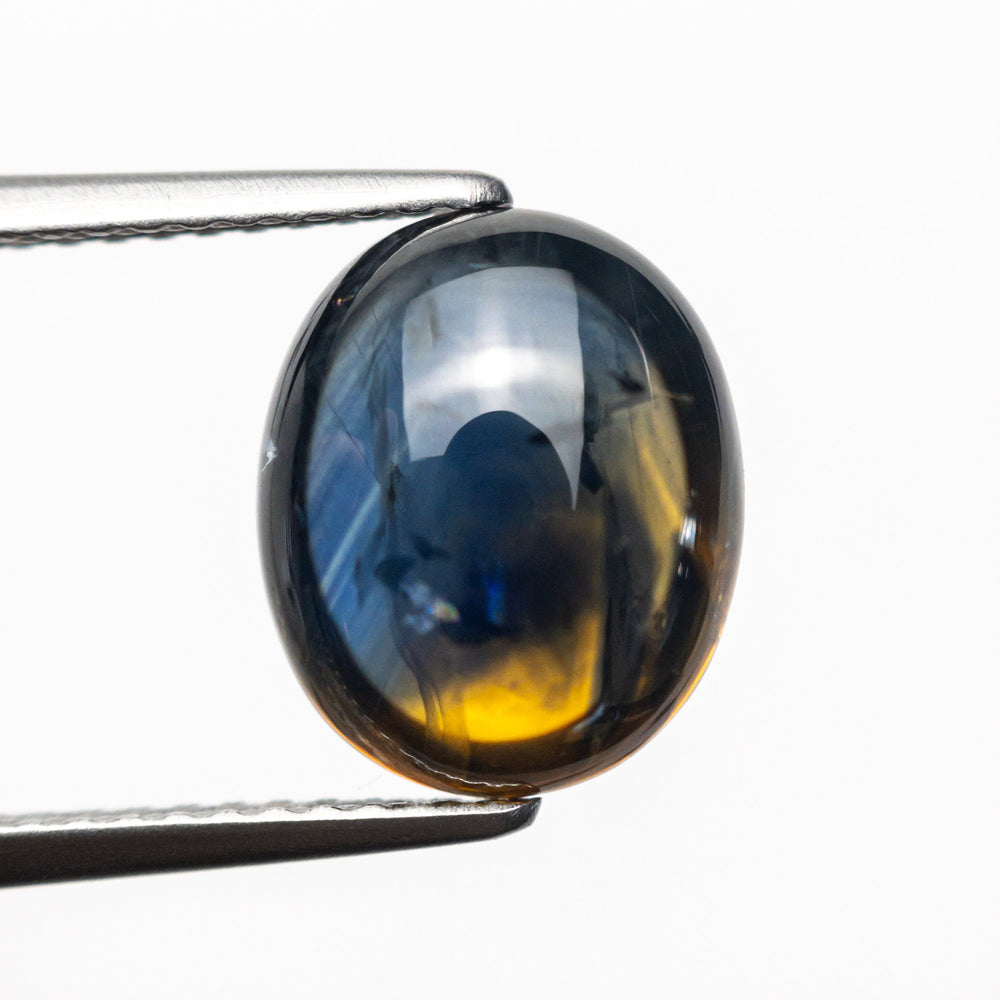 
            
                Load image into Gallery viewer, 4.82ct 10.66x8.83x5.12mm Oval Cabochon Cut Sapphire 23759-01
            
        