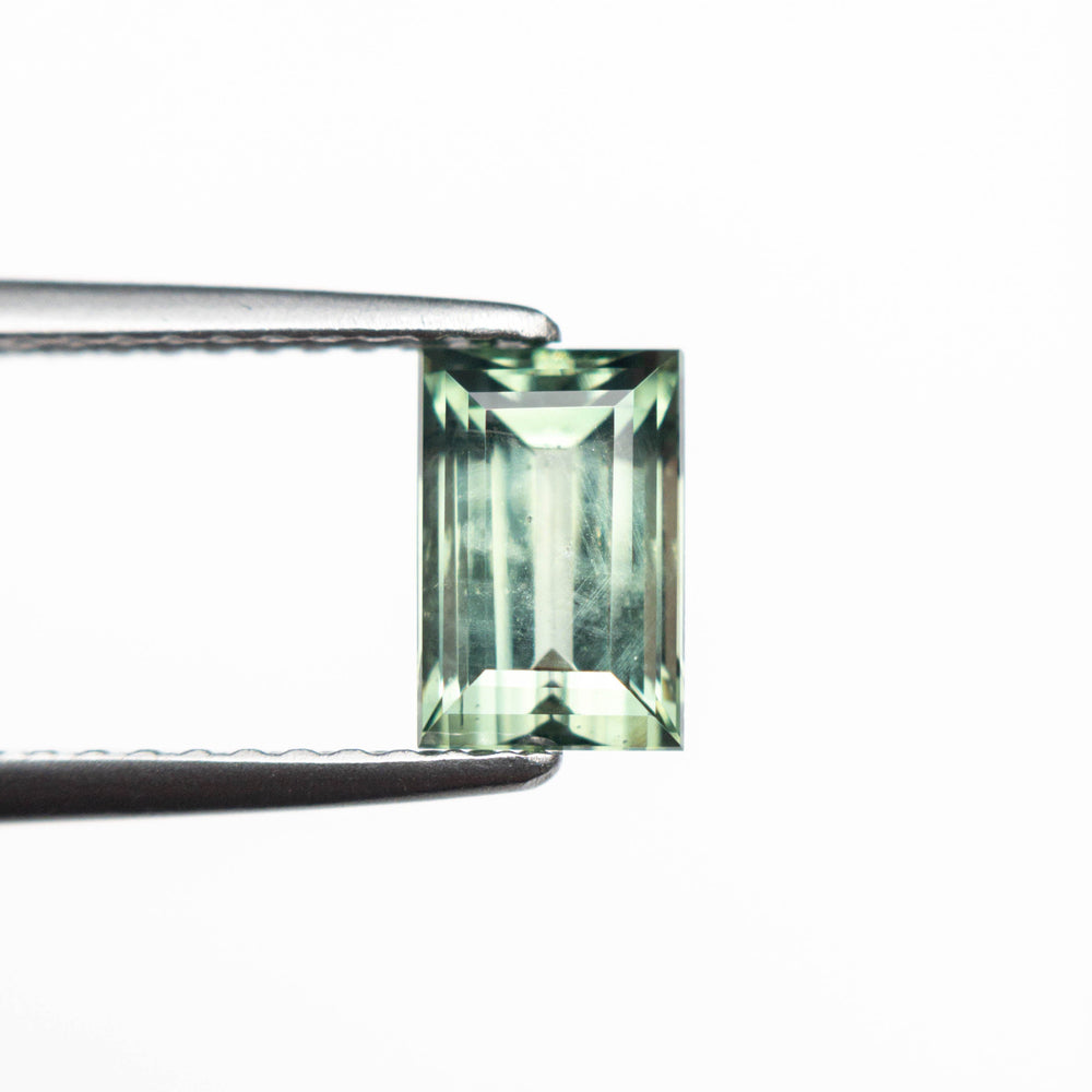 
            
                Load image into Gallery viewer, 1.26ct 6.93x4.57x3.56mm Rectangle Step Cut Sapphire 23788-01
            
        