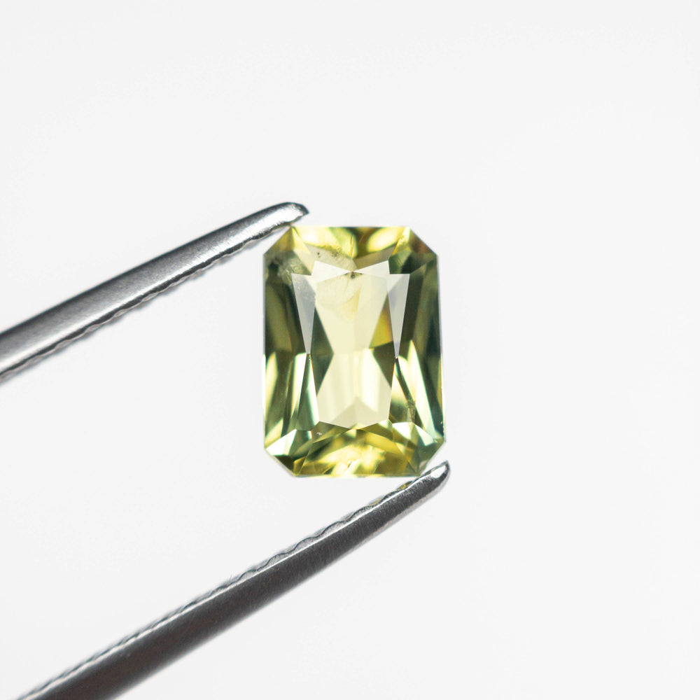 
            
                Load image into Gallery viewer, 1.01ct 6.79x4.88x3.04mm Cut Corner Rectangle Brilliant Sapphire 23805-12
            
        